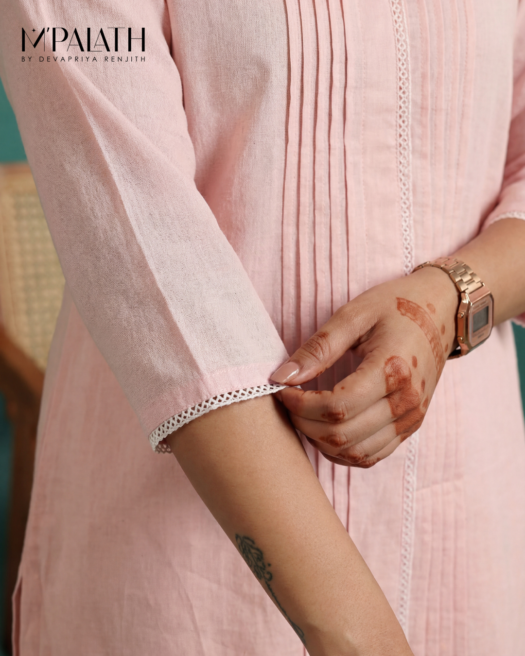 Blush Elegance peach bespoke occasion wear dress featuring delicate drape